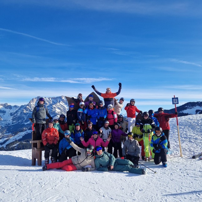 Ski Club GB Group photo with snow in the background